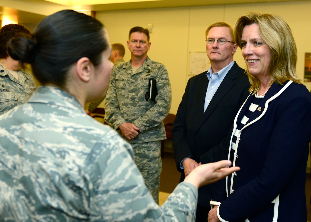 Secretary of the Air Force Deborah Lee James speaks with an Airman during a tour of the 31st Medical Group April 30, 2015, at Aviano Air Base, Italy. James learned about cutting-edge programs the group has implemented and thanked medics for their service. (U.S. Air Force photo/Senior Airman Areca T. Wilson)