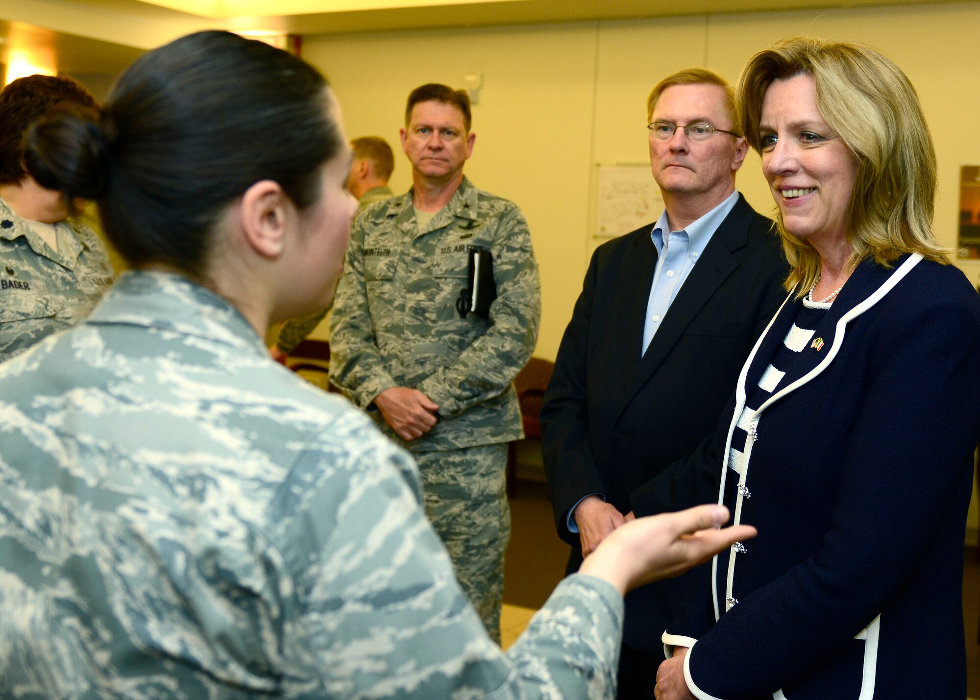 Secretary of the Air Force Deborah Lee James speaks with an Airman during a tour of the 31st Medical Group April 30, 2015, at Aviano Air Base, Italy. James learned about cutting-edge programs the group has implemented and thanked medics for their service. (U.S. Air Force photo/Senior Airman Areca T. Wilson)