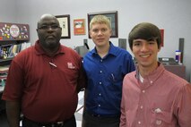 (L to R) Arthur Martin,III. chief, Military Integration Division, Michael Farris and Zane Oligee pose for a team photo during mentoring session April 17. 