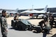 Republic of Korea Air Force members with the 38th Maintenance Squadron, prepare to load munitions onto an F-16 Fighting Falcon during the 2015 peninsula-wide load competition at Kunsan Air Base, Republic of Korea, April 25, 2015. The competition  had six teams representing the 35th and 80th Aircraft Maintenance Units, the 120th Expeditionary AMU, ROKAF’s 38 Maintenance Squadron, and the 36th and 25th AMUs from Osan AB. (U.S. Air Force photo by Senior Airman Divine Cox/Released)