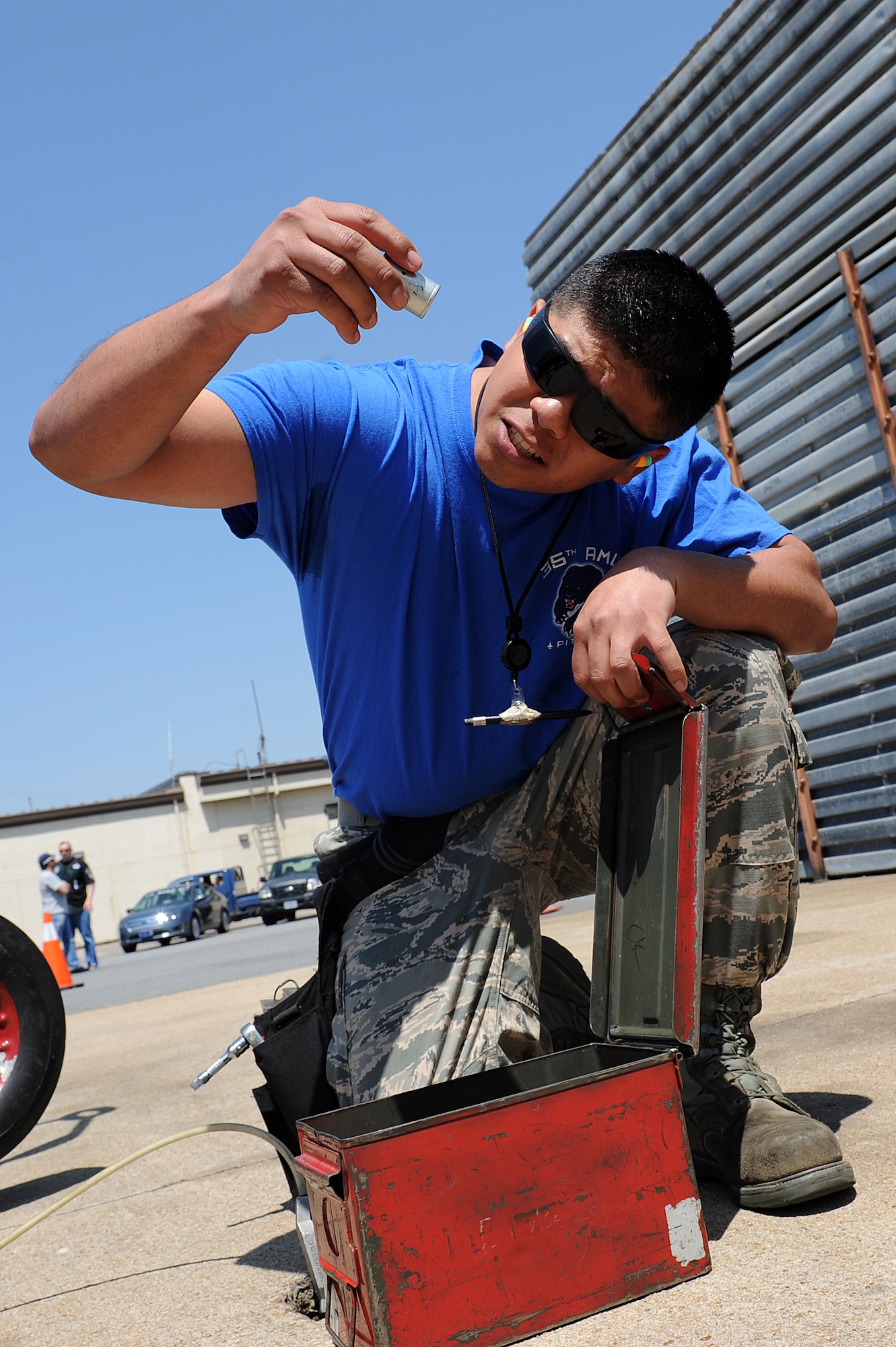 A U.S. Air Force member with the 35th Aircraft Maintenance Unit inspects his tools during the 2015 peninsula-wide load competition at Kunsan Air Base, Republic of Korea, April 25, 2015. The competition  had six teams representing the 35th and 80th Aircraft Maintenance Units, the 120th Expeditionary AMU, ROKAF’s 38 Maintenance Squadron, and the 36th and 25th AMUs from Osan AB. (U.S. Air Force photo by Senior Airman Divine Cox/Released)