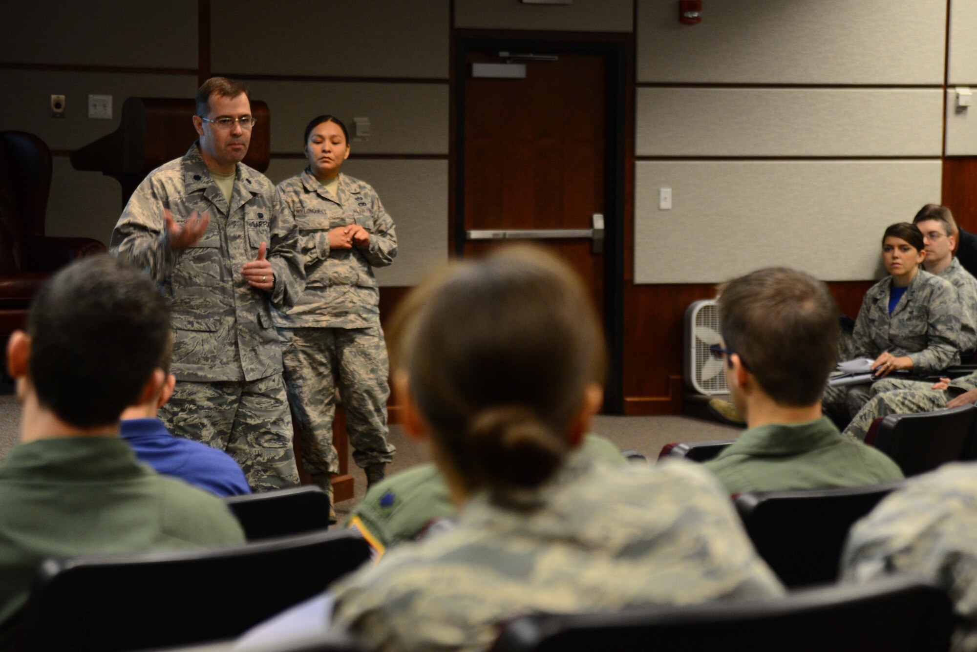 Lt. Col. Steven Smart, 22nd Air Refueling Wing Judge Advocate General’s staff judge advocate, speaks to base leadership on the military justice process, May 1, 2015, at McConnell Air Force Base, Kan. McConnell’s JAG office hosted a “Commander and the law” workshop that educated leadership on topics that will help promote good order and discipline in their squadrons. (U.S. Air Force photo by Airman 1st Class Christopher Thornbury)