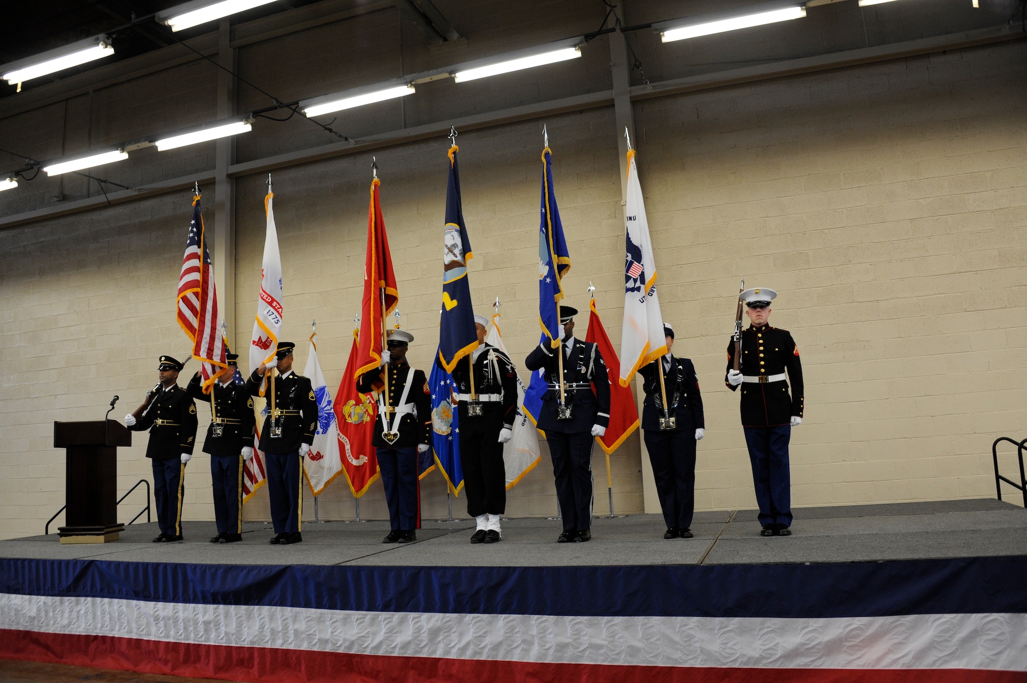 A joint color guard of service members from all military branches post the colors during the first Joint Retiree Appreciation Day held at Joint Base McGuire-Dix-Lakehurst for veterans March 25, 2015. (U.S. Air Force photo by Pascual Flores/Released)