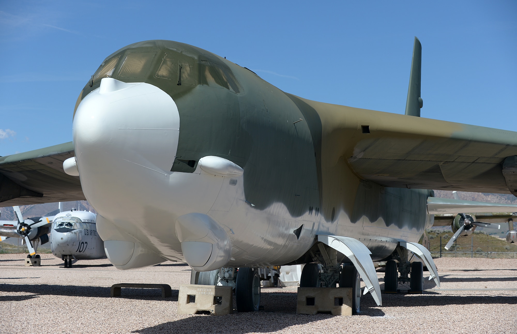 Hill Aerospace Museum's B-52G-100-BW (S/N 58-0191), nicknamed "Bearin' Arms," that was manufactured by Boeing Aircraft Corporation in Wichita, Kansas, and delivered to the Air Force on October 16, 1959, is masked off and receiving a new coat of paint just like Strategic Air Command B-52's were painted during the Vietnam War.  (U.S. Air Force photo/Alex R. Lloyd)