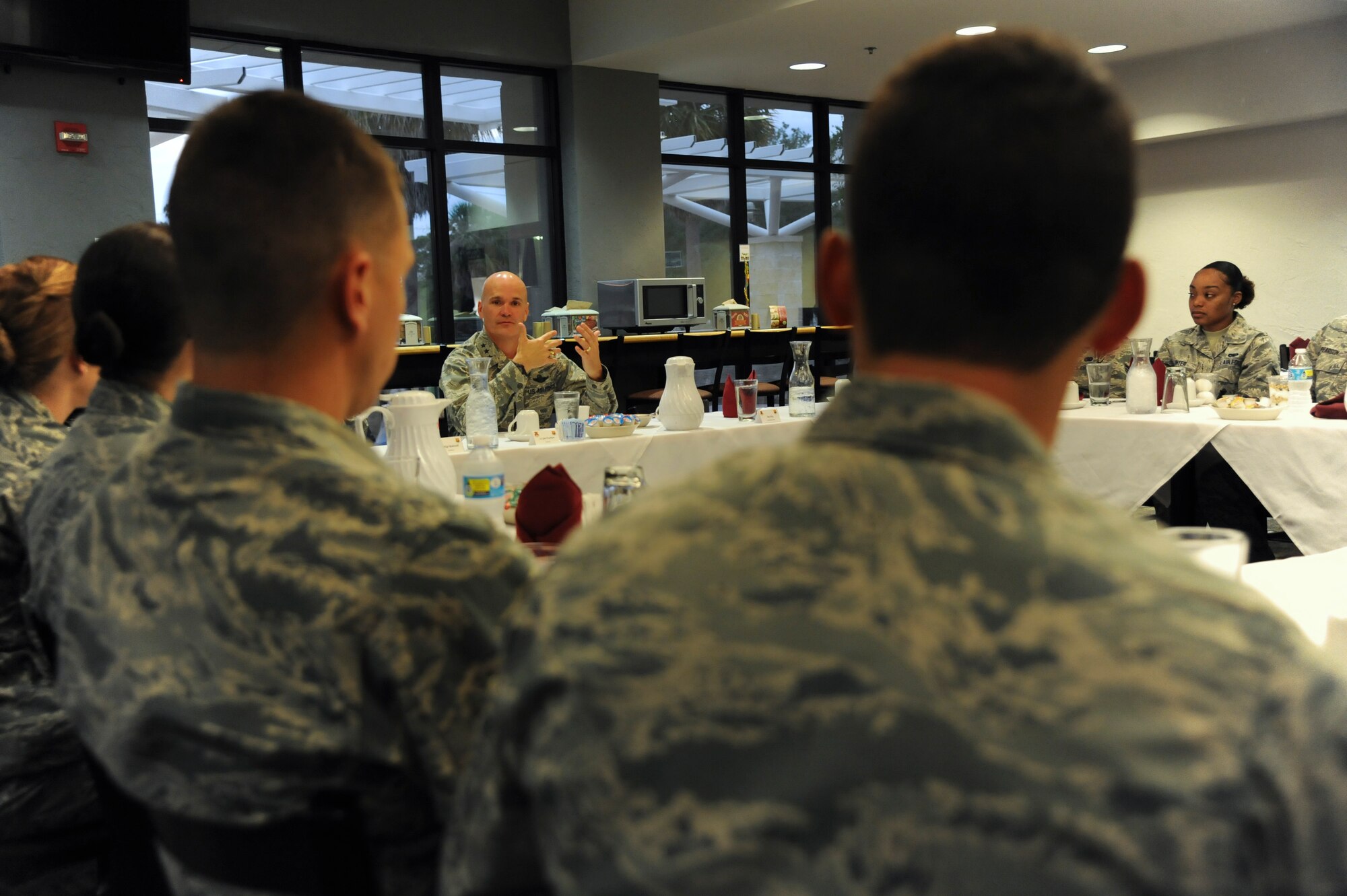 Lt. Gen. Carlton D. Everhart II, 18th Air Force commander, answers questions during the Airmen’s breakfast portion of his tour at MacDill Air Force Base, Fla., April 30, 2015. The casual setting allowed Airmen to freely share their questions and concerns about current Air Force topics with the general. (U.S. Air Force photo by Airman 1st Class Danielle Conde/Released)