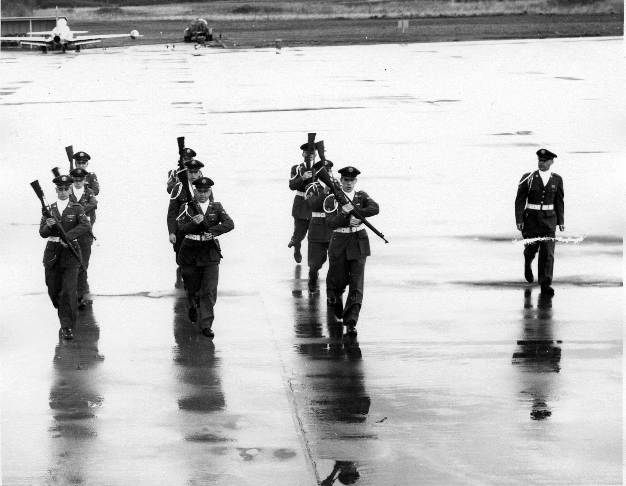 OreANG Precision Rifle Drill Team members twirl their rifles while marching during a practice at Portland AFB circa late 1960.  (142FW History Archives)