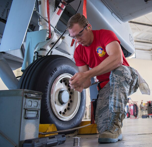 U.S. Air Force Senior Airman Zachary Spurlin, 75th Aircraft Maintenance Unit weapons load crew member, sets the value on a torque wrench during the load crew of the quarter competition April 24, 2015, at Moody Air Force Base, Ga. Spurlin assisted the 75th AMU in winning the competition by minimizing discrepancies while loading an A-10C Thunderbolt II. (U.S. Air Force photo by Airman Greg Nash/Released)