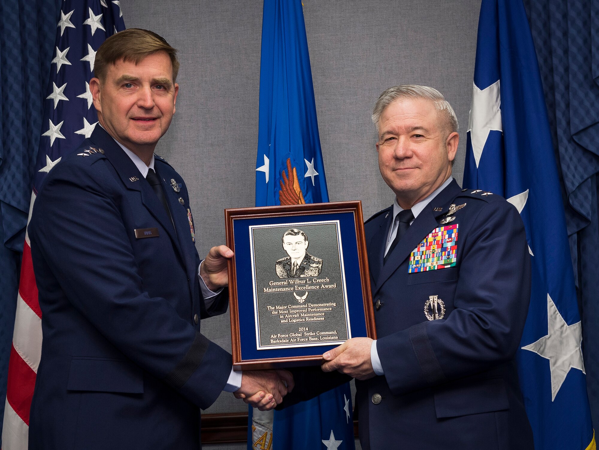 Air Force Assistant Vice Chief of Staff Lt. Gen. Stephen Hoog presented the Gen. Wilber L. Creech Maintenance Excellence Award to Maj. Gen. Keith Kries on behalf of Global Strike Command, Barksdale Air Force Base, La., during a ceremony in the Pentagon, Washington, D.C., April 28, 2015. The Creech Maintenance Award recognizes the major command demonstrating the most improved performance in aircraft maintenance and logistics readiness in a given fiscal year. (U.S. Air Force photo/Jim Varhegyi)