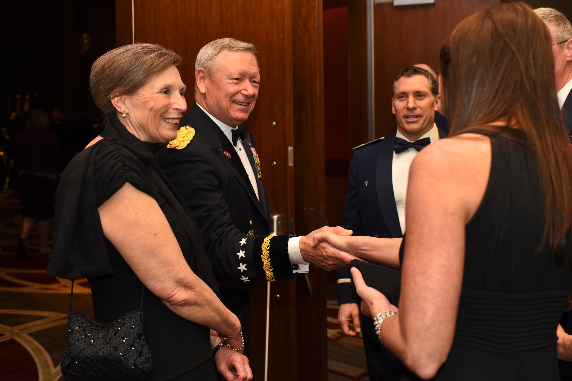 U.S. Army Gen. Frank J. Grass (middle left), Chief of the National Guard Bureau, and his wife, Patricia Grass (left), speak with attendees of the Ohio National Guard Association and Ohio National Guard Enlisted Association Spring Dinner Dance, Columbus, Ohio, April 25, 2015. Gen. Grass was the guest speaker at the event which is held annually for association members in both the Air and Army National Guard. (U.S. National Guard photo by Senior Airman Wendy Kuhn/Released)