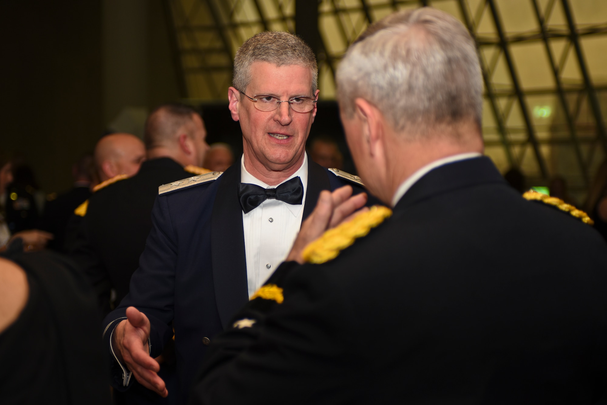 U.S. Air Force Maj. Gen. Mark E. Bartman (left), Ohio adjutant general, speaks with U.S. Army Gen. Frank J. Grass (right), Chief of the National Guard Bureau, prior to the Ohio National Guard Association and Ohio National Guard Enlisted Association Spring Dinner Dance, Columbus, Ohio, April 25, 2015. Gen. Grass was the guest speaker at the event which is held annually for association members in both the Air and Army National Guard. (U.S. National Guard photo by Senior Airman Wendy Kuhn/Released)