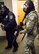 Members of the 49th Security Forces Squadron clear a building during an active shooter exercise April 30, 2015 at Holloman Air Force Base, N.M. Multiple times per year, Holloman hosts active shooter exercises to test procedures and maintain readiness in case of a real-world emergency. (U.S. Air Force photo by Airman 1st Class Emily A. Kenney/Released)  