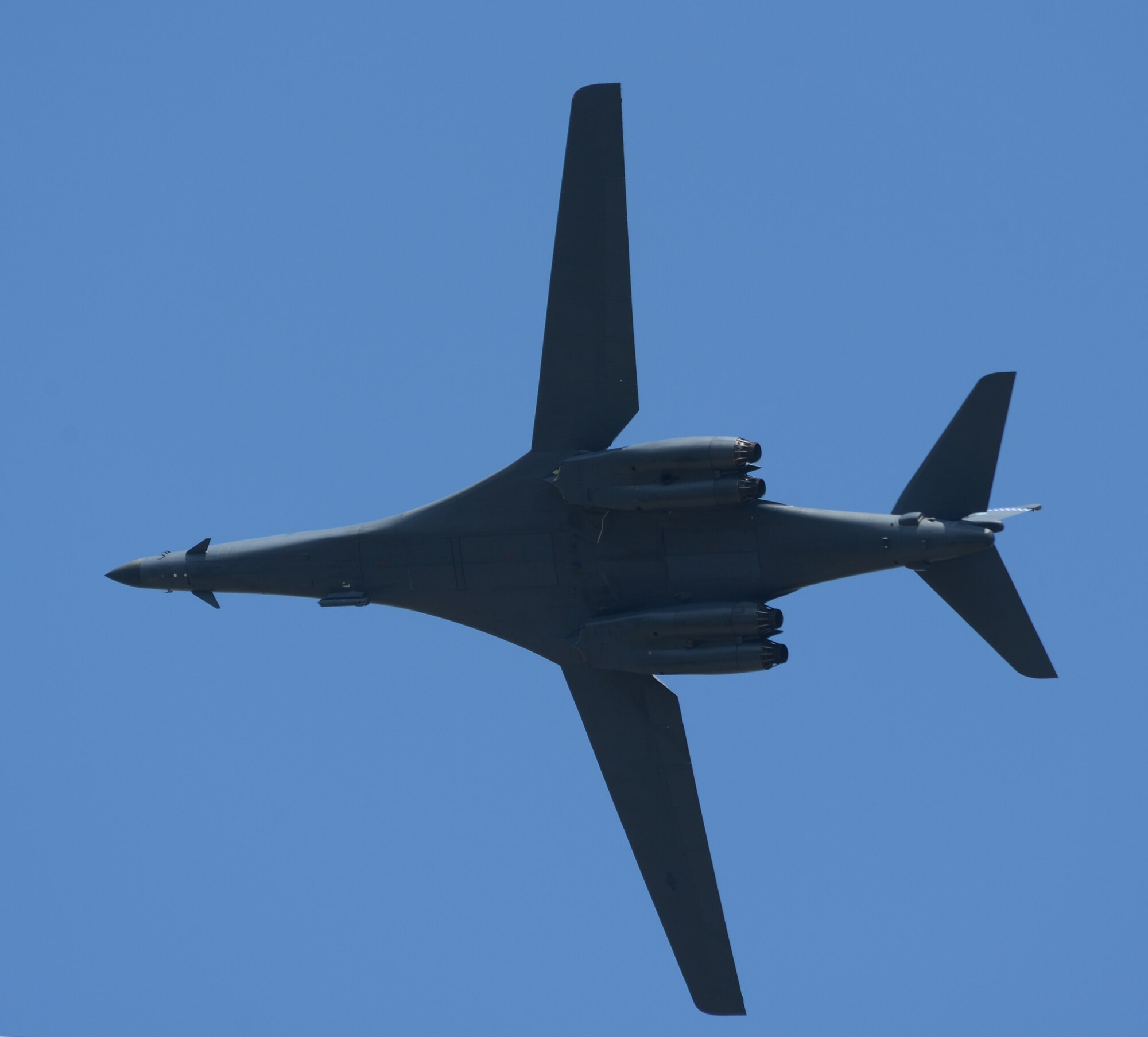 A B-1B Lancer from Dyess Air Force Base, Texas, soars over Barksdale Air Force Base, Louisiana, April 30, 2015. The B-1 can rapidly deliver massive quantities of precision and non-precision weapons against any adversary, anywhere in the world, at any time. (U.S. Air Force photo/Senior Airman Benjamin Gonsier)