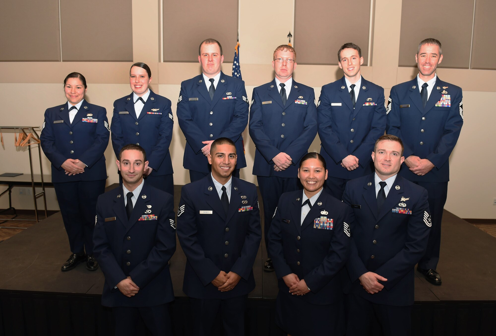 10 Team Buckley members were promoted to their next ranks April 30, 2015, at the Leadership Development Center on Buckley Air Force Base, Colo. A promotion ceremony is a time-honored tradition in the Air Force, allowing co-workers, family and friends to support and congratulate Airmen on their promotion. (U.S. Air Force photo by Airman 1st Class Samantha Meadors/Released)
