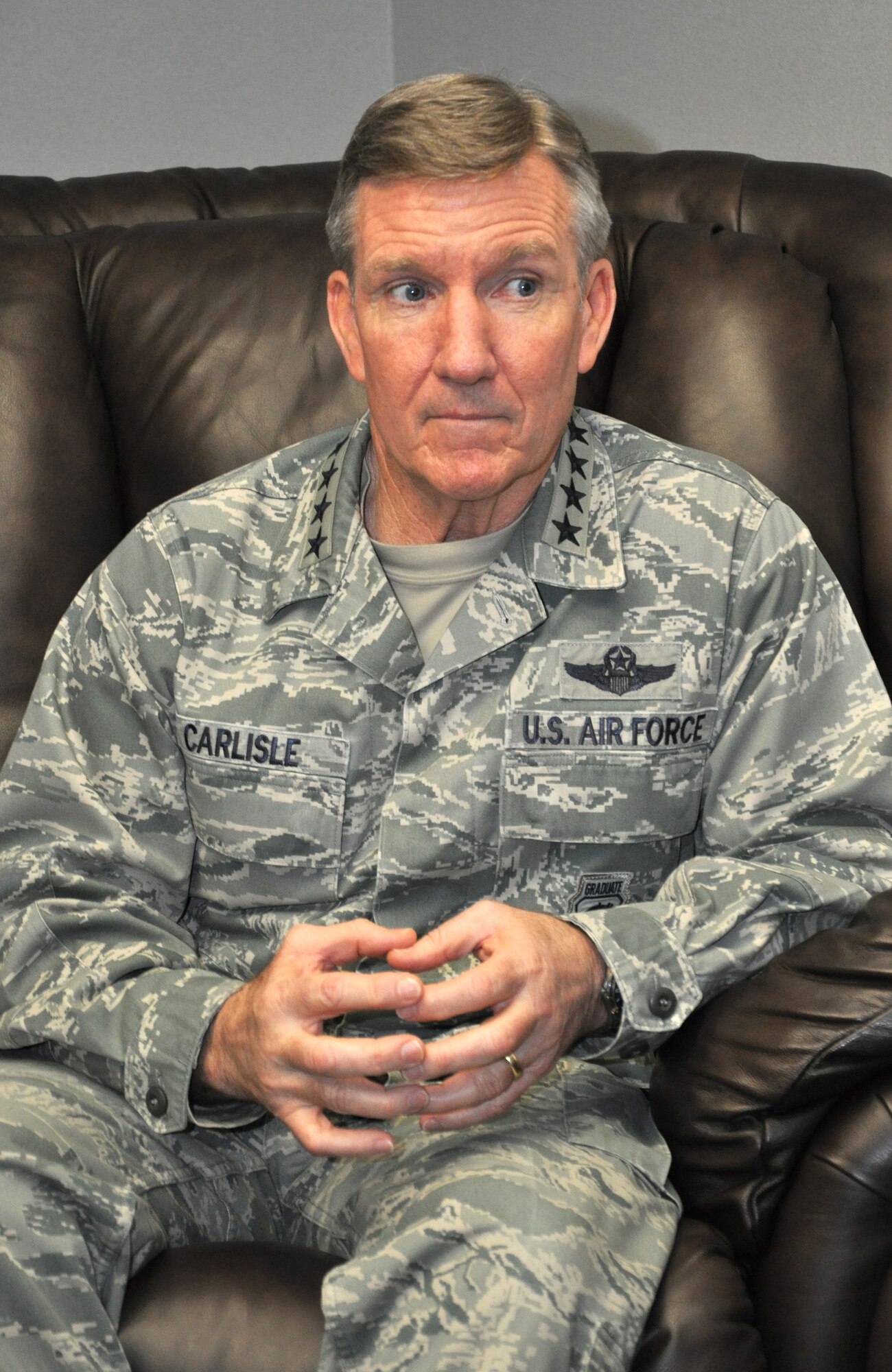 Gen. Hawk Carlisle, commander of Air Combat Command, responds to a question from Paula Burkes, a reporter with The Oklahoman, during an interview at the conclusion of his two-day visit to Tinker Air Force Base, April 21-22. (Air Force photo by Darren D. Heusel/Released)