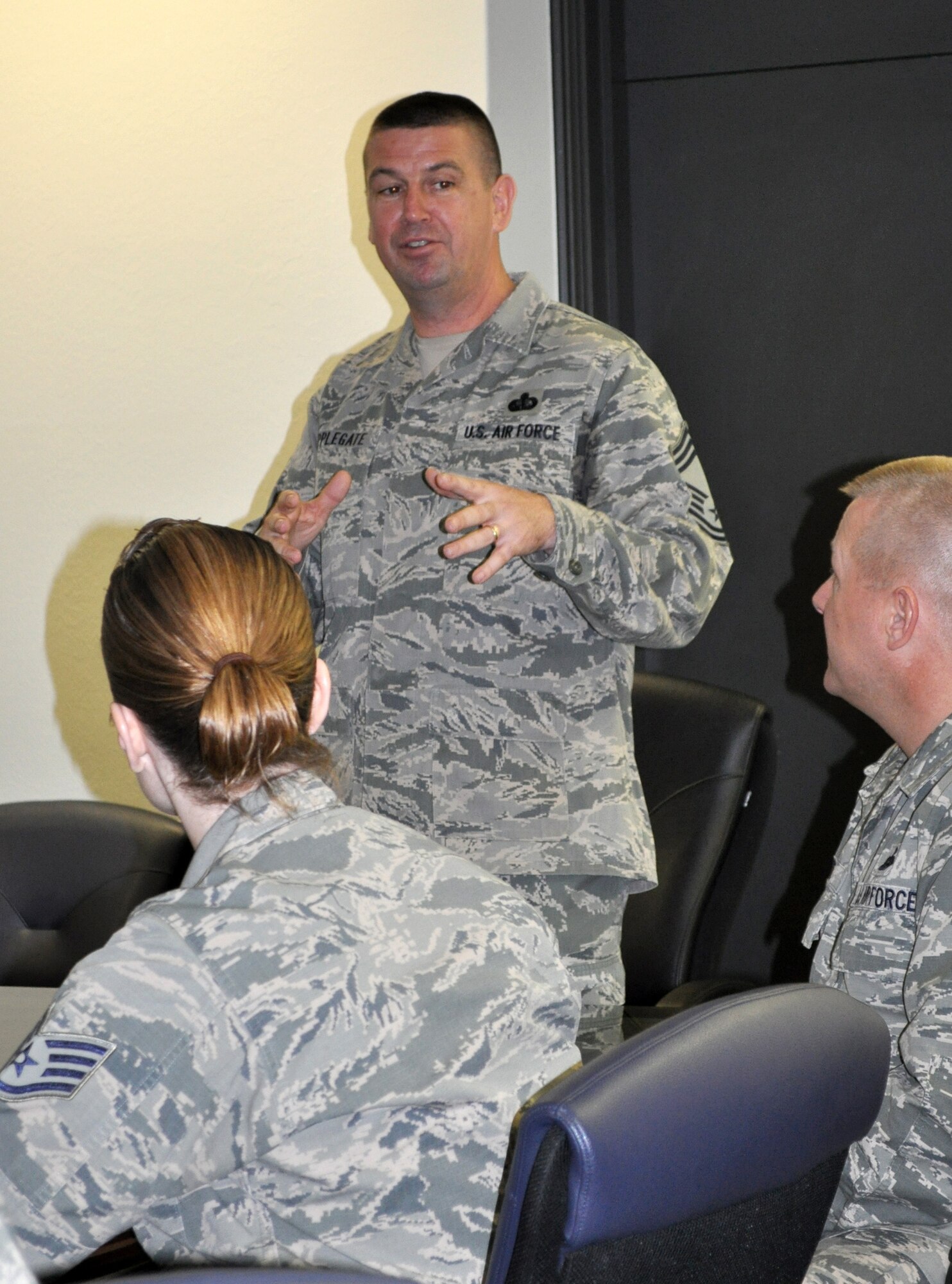 Chief Master Sgt. Sean E. Applegate speaks to an audience April 15 in the 72nd Air Base Wing conference room. The Dallas-based chief is the senior enlisted adviser for the Army & Air Force Exchange Service. Chief Applegate is the liaison between Exchange leadership and Army and Air Force active duty, Guard, Reserve, family members and retired patrons. He visited Exchange facilities at Tinker and Vance Air Force Bases. (Air Force photo by John Parker/Released)