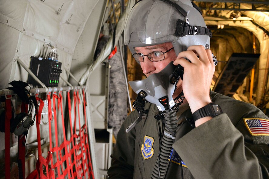 Air Force Airman 1st Class Jared Gough, a C-130J Super Hercules aircraft loadmaster from the 40th Airlift Squadron, Dyess AFB, Texas, tests his oxygen mask during preflight checks before a Combined Joint Operational Access Exercise 15-01 sortie on Apr. 16, 2015, Pope Army Airfield, N.C. CJOAX 15-01 is an 82nd Airborne Division-led bilateral training event at Fort Bragg, N.C., from April 13-20, 2015. This is the largest exercise of
its kind held at Fort Bragg in nearly 20 years and demonstrates interoperability between U.S. and U.K. Army soldiers and U.S. Air Force, Air National Guard, Royal Air Force Airmen and U.S. Marines. (U.S. Air Force photo/Marvin Krause)
