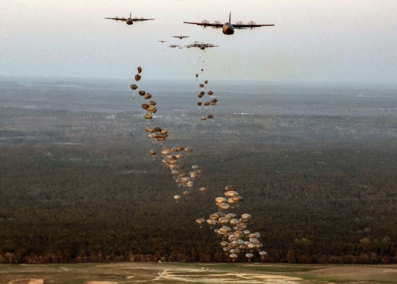 Paratroopers from the 2nd Brigade Combat Team, 82nd Airborne Division and British paratroopers from the 3rd Battalion, the Parachute Regiment, 16 Air Assault Brigade perform a static-line jump in preparation for Combined Joint Operational Access Exercise 15-01 at Fort Bragg, N.C., April 11, 2015. CJOAX 15-01 is an 82nd Airborne Division-led bilateral training event at Fort Bragg, N.C., from April 13-20, 2015. This is the largest exercise of its kind held at Fort Bragg in nearly 20 years and demonstrates interoperability
between U.S. Army and British Army soldiers, U.S. Air Force, Air National Guard and Royal Air Force airmen, and U.S. Marines. (US Air Force photo by Staff Sgt. Corey Hook/ Released)
