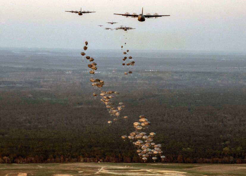 Paratroopers from the 2nd Brigade Combat Team, 82nd Airborne Division and British paratroopers from the 3rd Battalion, the Parachute Regiment, 16 Air Assault Brigade perform a static-line jump in preparation for Combined Joint Operational Access Exercise 15-01 at Fort Bragg, N.C., April 11, 2015. CJOAX 15-01 is an 82nd Airborne Division-led bilateral training event at Fort Bragg, N.C., from April 13-20, 2015. This is the largest exercise of its kind held at Fort Bragg in nearly 20 years and demonstrates interoperability
between U.S. Army and British Army soldiers, U.S. Air Force, Air National Guard and Royal Air Force airmen, and U.S. Marines. (US Air Force photo by Staff Sgt. Corey Hook/ Released)
