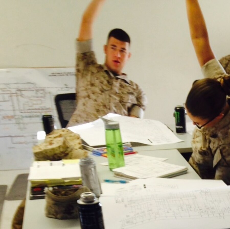 Marines from BEEEST 5-15 learn about A-1 backplane module schematics.