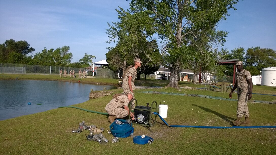 Marines from BWST 6-15 learn how to operate pumps through practical application.