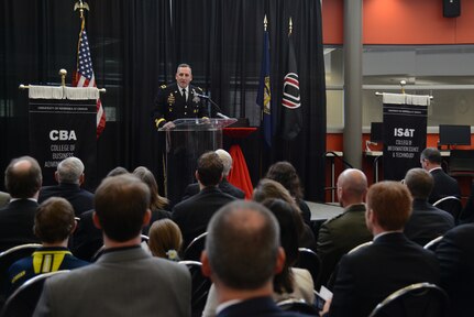 U.S. Army Maj. Gen. John Uberti, U.S. Strategic Command chief of staff, delivers the keynote speech during a USSTRATCOM Leadership Fellows Program graduation ceremony at the University of Nebraska's Peter Kiewit Institute in Omaha, May 1, 2015. During the program, the 10 hand-selected USSTRATCOM civilian employees spent 13 weeks, in a classroom-based, hands-on environment, learning from university national security and defense experts and honing their skills in team building, collaboration management, data-driven decision making and project management. The fellowship program, launched in March 2014, is part of USSTRATCOM's ongoing effort to build enduring relationships with partner organizations, such as the University of Nebraska's National Strategic Research Institute, from the private sector, academia and allied nations. USSTRATCOM is one of nine DoD unified combatant commands and is charged with strategic deterrence; space operations; cyberspace operations; joint electronic warfare; global strike; missile defense; intelligence, surveillance and reconnaissance; combating weapons of mass destruction; and analysis and targeting. (USSTRATCOM photo by U.S. Air Force Staff Sgt. Jonathan Lovelady) More photos at https://www.flickr.com/photos/usstratcom/sets/72157651949597089/