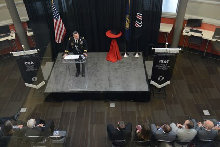 Members of the second U.S. Strategic Command Leadership Fellows Program commemorate their achievements during their graduation ceremony at the University of Nebraska's Peter Kiewit Institute in Omaha, May 1, 2015. During the program, the 10 hand-selected USSTRATCOM civilian employees spent 13 weeks, in a classroom-based, hands-on environment, learning from university national security and defense experts and honing their skills in team building, collaboration management, data-driven decision making and project management. The fellowship program, launched in March 2014, is part of USSTRATCOM's ongoing effort to build enduring relationships with partner organizations, such as the University of Nebraska's National Strategic Research Institute, from the private sector, academia and allied nations. USSTRATCOM is one of nine DoD unified combatant commands and is charged with strategic deterrence; space operations; cyberspace operations; joint electronic warfare; global strike; missile defense; intelligence, surveillance and reconnaissance; combating weapons of mass destruction; and analysis and targeting. (USSTRATCOM photo by U.S. Air Force Staff Sgt. Jonathan Lovelady) More photos at https://www.flickr.com/photos/usstratcom/sets/72157651949597089/