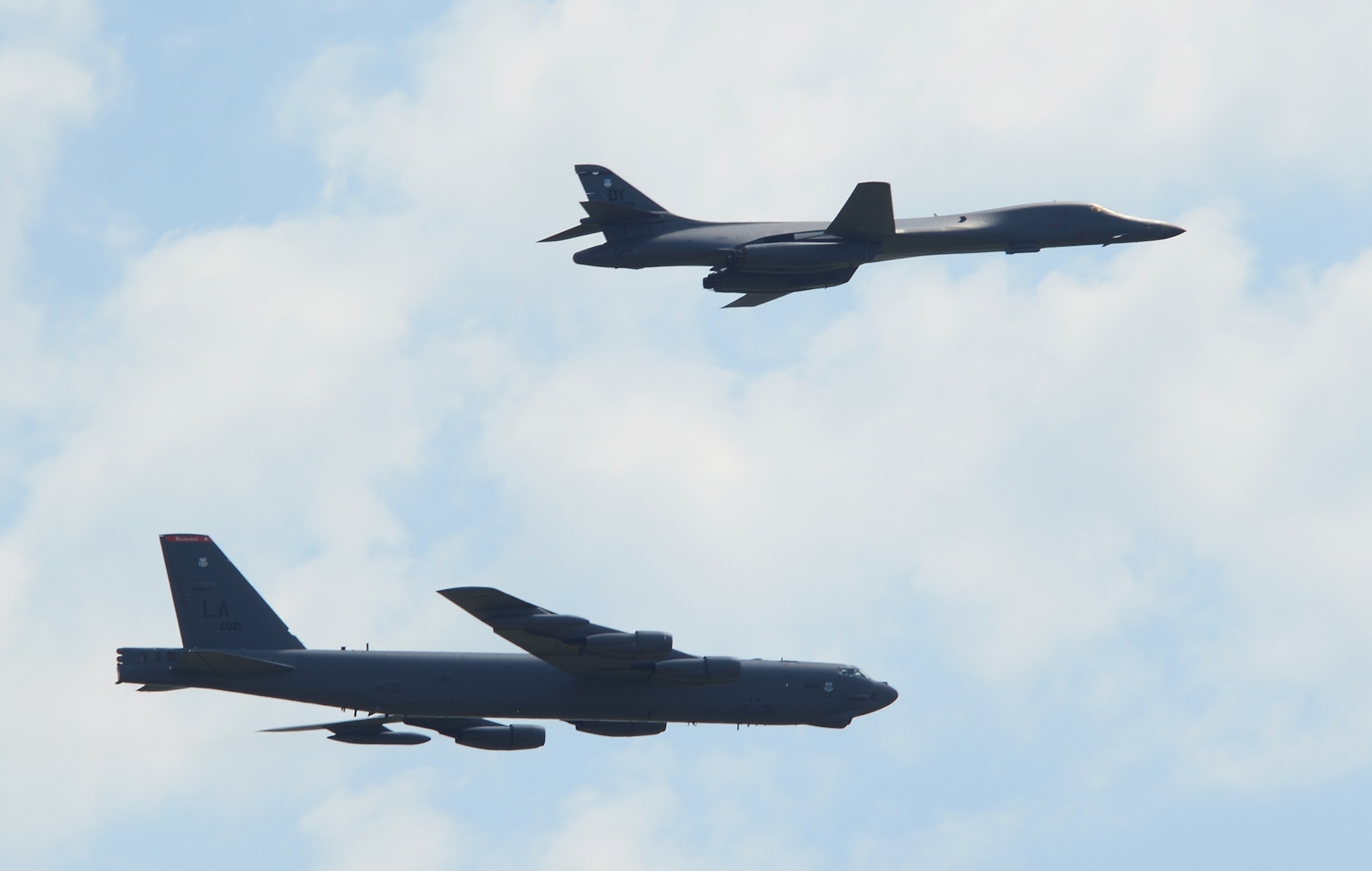 A B-52H Stratofortress and B-1B Lancer soar in the sky during the 2015 Defenders of Liberty Air Show at Barksdale Air Force Base, Louisiana, May 2. Starting Oct. 1, the B-1 bomber fleet will realign from Air Combat Command to Air Force Global Strike Command. Under the realignment, 63 aircraft and more than 7,000 personnel will join AFGSC. (U.S. Air Force photo/Senior Airman Benjamin Gonsier)