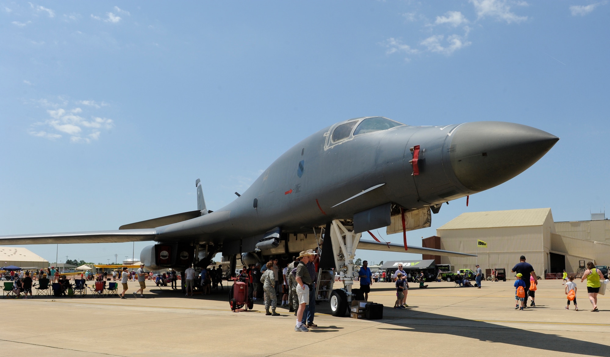 Spectators tour a B-1B Lancer from Dyess Air Force Base, Texas, during the 2015 Defenders of Liberty Air Show at Barksdale Air Force Base, Louisiana, May 2. Starting Oct. 1, the B-1 bomber fleet from Ellsworth and Dyess Air Force Base will realign from Air Combat Command to Air Force Global Strike Command. Under the realignment, 63 aircraft and more than 7,000 personnel will join AFGSC. (U.S. Air Force photo/Senior Airman Benjamin Gonsier)