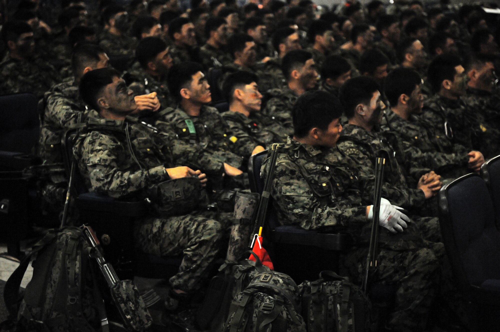 Members from the Republic of Korea Special Operations Forces 35th Battalion, 7th Airborne Brigade, receive a briefing on training scenarios April 29, 2015, at Kunsan Air Base, Republic of Korea. For the first time in more than seven years, ROKSOF integrated operations with Wolf Pack defenders during a 24-hour exercise held in conjunction with Exercise Beverly Midnight 15-3. (U.S. Air Force photo by Senior Airman Divine Cox/Released)