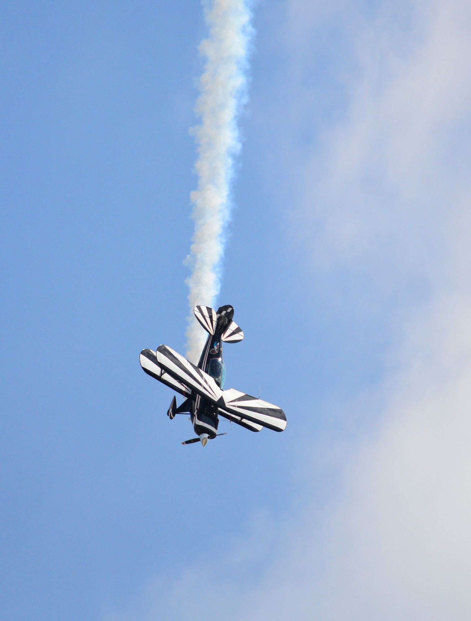 Dave Leedom performs an aerobatic maneuver for spectators during the 2015 Defenders of Liberty Air Show at Barksdale Air Force Base, Louisiana, May 2. Leedom wowed visitors with multiple G-pulling stunts in his aerobatic Bi-plane. (U.S. Air Force photo/Senior Airman Benjamin Raughton)