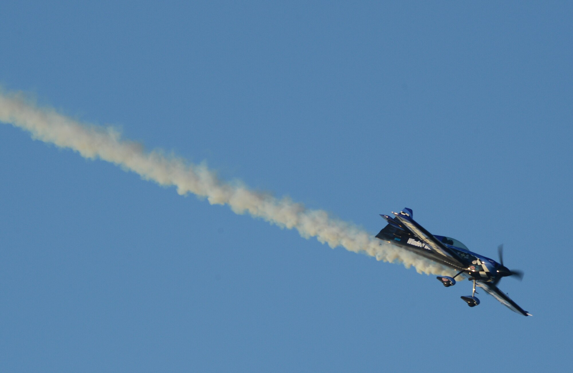 An MXS-RH, piloted by Rob Holland, performs an aerial maneuver during the 2015 Defenders of Liberty Air Show at Barksdale Air Force Base, La., May 1. A pilot since 1992, Holland has accumulated more than 11,000 hours flight time in more than 170 different types of aircraft. (U.S. Air Force photo/Senior Airman Benjamin Gonsier)