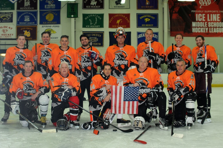 The newly-formed Horsham Reapers hockey team poses for a photo before their first official practice and tournament at Ice Line Quad Rinks, April 25, 2015, in West Chester, Pennsylvania. The crew is comprised of members from the 111th Attack Wing and the 56th Stryker Brigade Combat Team at Horsham Air Guard Station, Pennsylvania, as well as family and friends of 111th ATKW members. (U.S. Air National Guard photo by Tech. Sgt. Andria Allmond/Released)