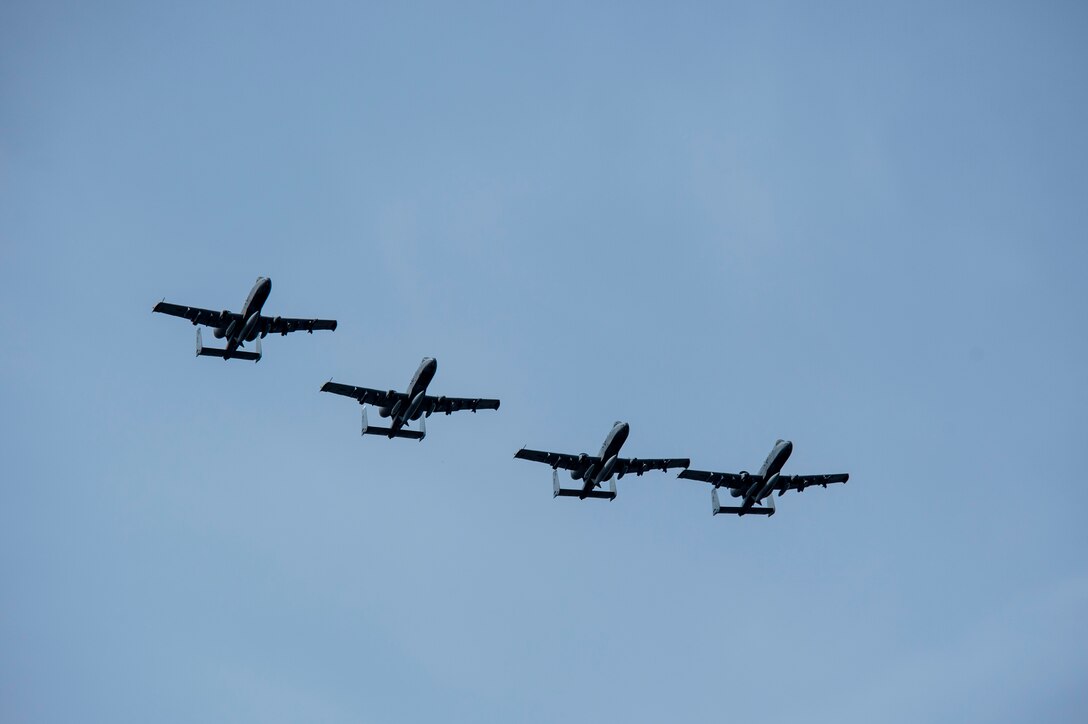 Four A-10 Thunderbolt II attack aircraft fly over Ämari Air Base, Estonia, May 1, 2015. The U.S. is committed to acting collectively with NATO allies and the international community to address security challenges in Europe and around the world. (U.S. Air Force photo by Senior Airman Rusty Frank/Released)