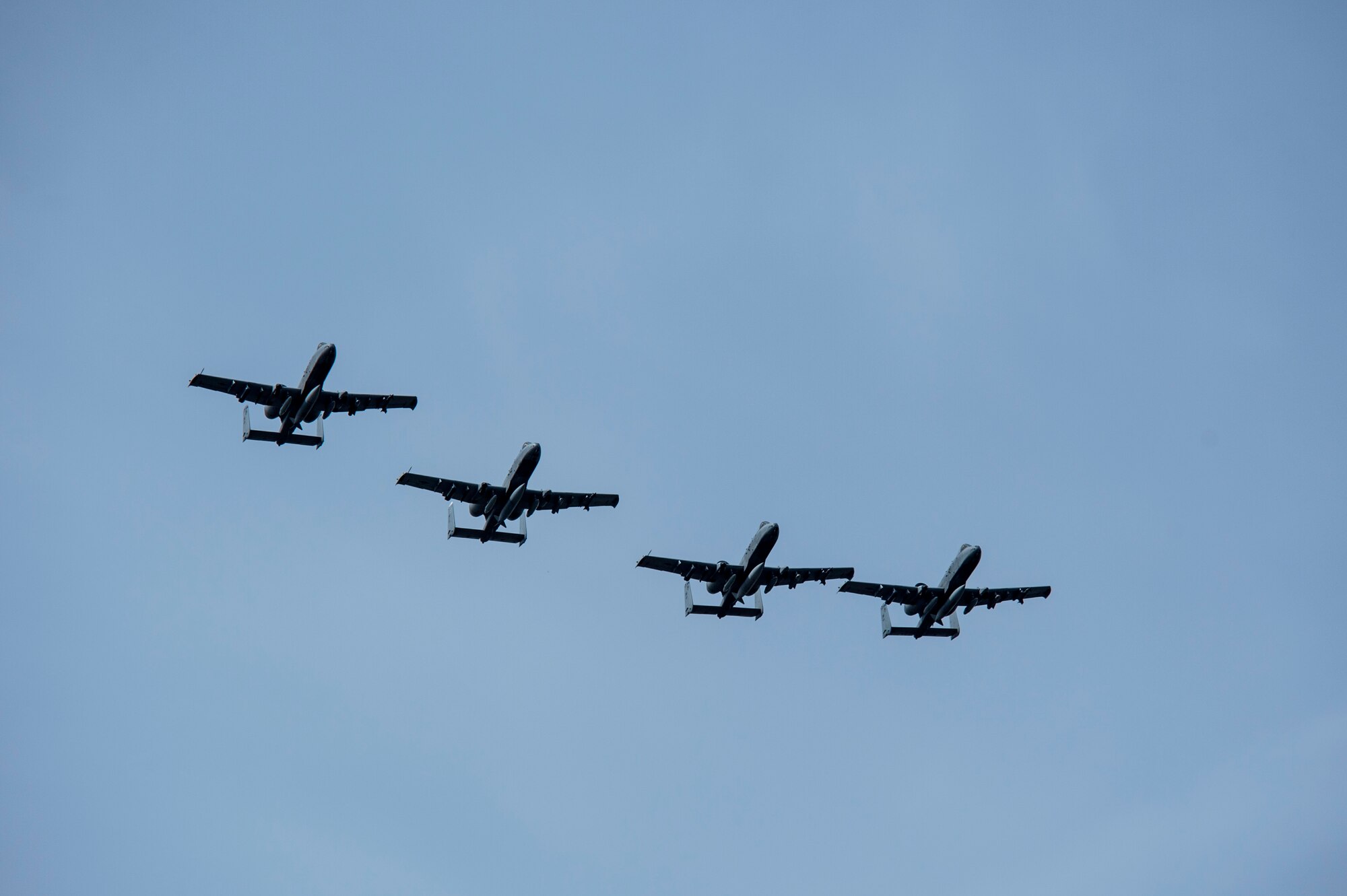 Four A-10 Thunderbolt II attack aircraft fly over Ämari Air Base, Estonia, May 1, 2015. The U.S. is committed to acting collectively with NATO allies and the international community to address security challenges in Europe and around the world. (U.S. Air Force photo by Senior Airman Rusty Frank/Released)