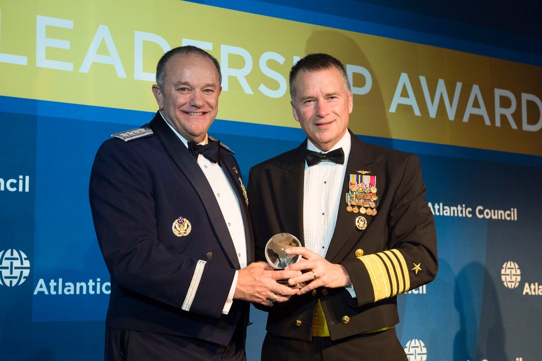 Navy Adm. James A. Winnefeld Jr., right, vice chairman of the Joint Chiefs of Staff, presents Air Force Gen. Philip M. Breedlove, Supreme Allied Commander Europe and commander of U.S. European Command, with the Atlantic Council’s Distinguished Military Leadership Award during an awards dinner in Washington, D.C., April 30, 2015. DoD photo by U.S. Army Staff Sgt. Sean K. Harp