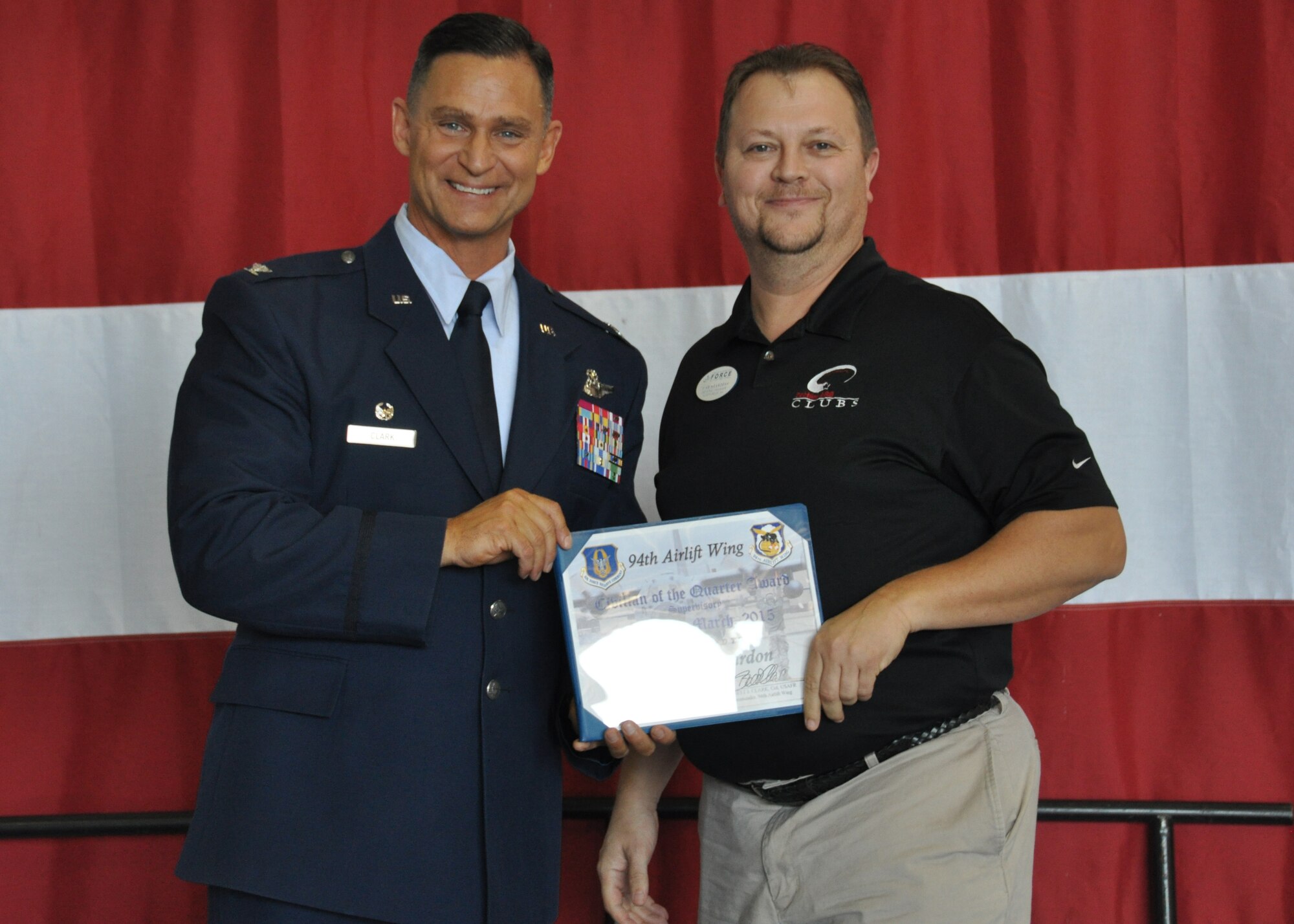 Mike Reardon, of the 94th Force Support Squadron, receives the 2015 first quarter supervisory civilian of the quarter award at Dobbins Air Reserve Base, Ga, May 2. Reardon was one of many distinguished individuals to be recognized at the May unit training assembly Commander’s Call. (U.S. Air Force photo/ Senior Airman Miles Wilson)