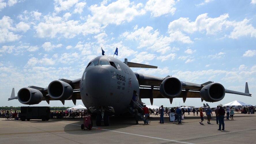 Spectators tour a C-17A Globemaster III during the 2015 Defenders of Liberty Airshow at Barksdale Air Force Base, Louisiana, May 2. The C-17, designed to airdrop 102 paratroopers and equipment, has a maximum payload capacity of 170,000 pounds and an unrefueled range of approximately 2,400 nautical miles. (U.S. Air Force photo/Airman 1st Class Curt Beach)