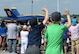 Children wave as a U.S. Navy Flight Demonstration Team Blue Angels F/A-18 Hornet prepares to take off during the 2015 Defenders of Liberty Airshow at Barksdale Air Force Base, Louisiana, May 2. The mission of the Blue Angels is to showcase the pride and professionalism of the United States Navy and Marine Corps by inspiring a culture of excellence and service to country through flight demonstrations and community outreach. (U.S. Air Force photo/Airman 1st Class Curt Beach)