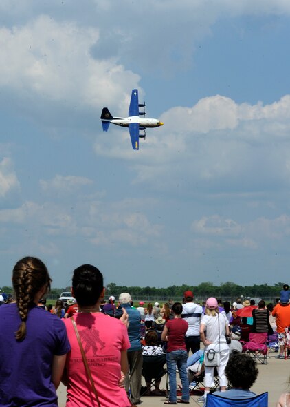The U.S. Navy Flight Demonstration Team Blue Angels C-130 Hercules, Fat Albert, soars over the flightline during the 2015 Defenders of Liberty Airshow on Barksdale Air Force Base, Louisiana, May 3. Around 40 Airmen had the opportunity to fly in the C-130 while thousands of others enjoyed the show from the ground. (U.S. Air Force photo/Senior Airman Joseph A. Pagán Jr.)