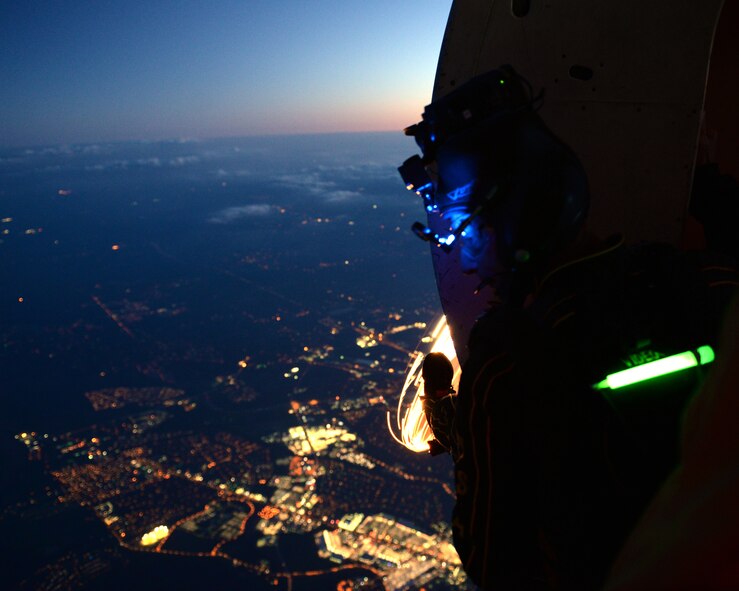 A U.S. Army Parachute Team “Golden Knights” parachutist prepares to jump from a C-31A Troopship during the 2015 Defenders of Liberty Airshow at Barksdale Air Force Base, Louisiana, May 1. The Golden Knights represent the finest Soldiers and personifies the Army values, showing the world the professionalism, precision, and discipline of today’s modern Army. (U.S. Air Force photo/Airman 1st Class Curt Beach)