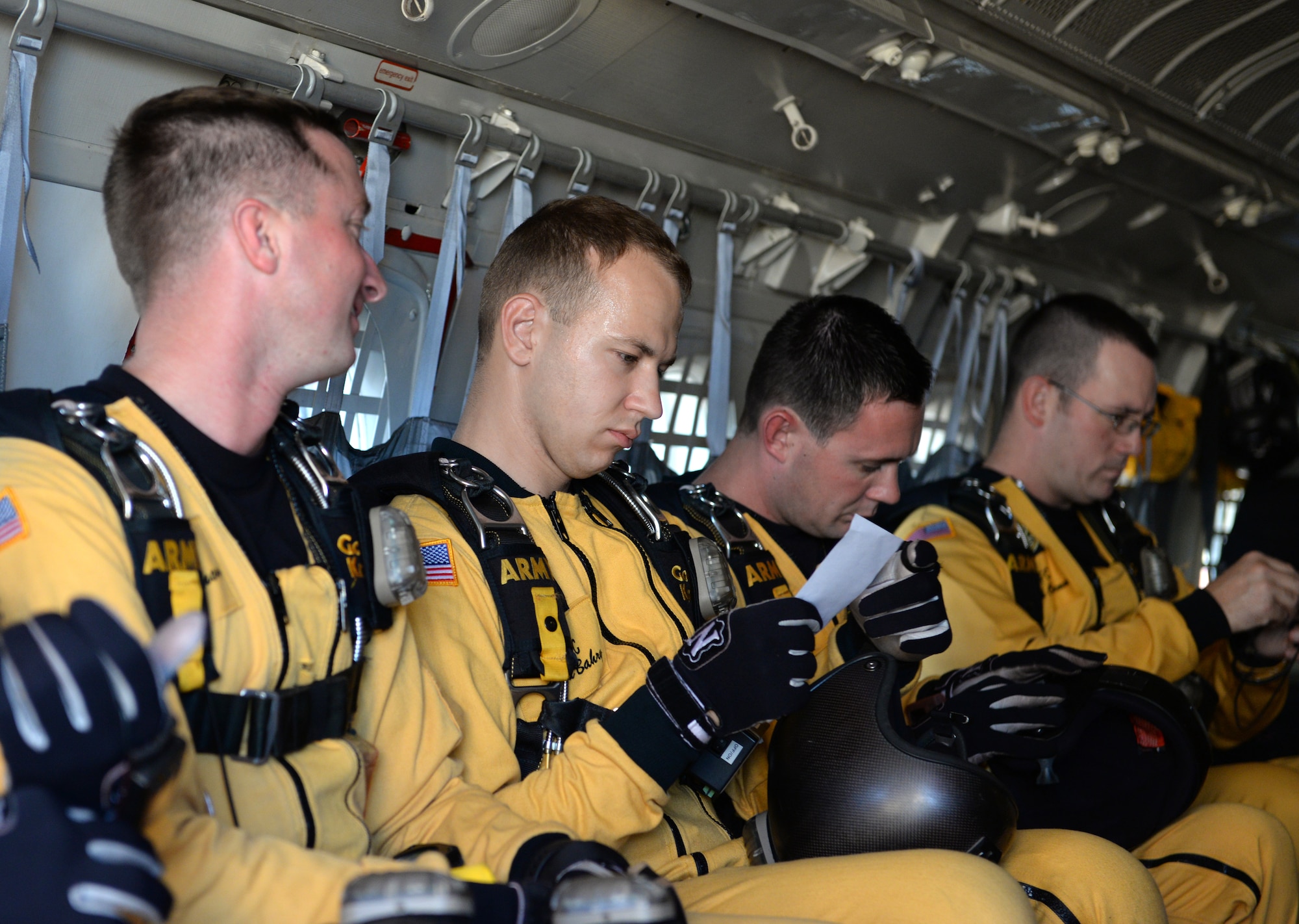 At 12,500 feet, the U.S. Army Parachute Team "Golden Knights" await to jump from a C-31A Troopship above Barksdale Air Force Base, Louisiana, May 1, 2015. The Golden Knights, stationed at Fort Bragg, North Carolina, visited Barksdale to take part in the Defenders of Liberty Airshow. (U.S. Air Force photo/Airman 1st Class Curt Beach)