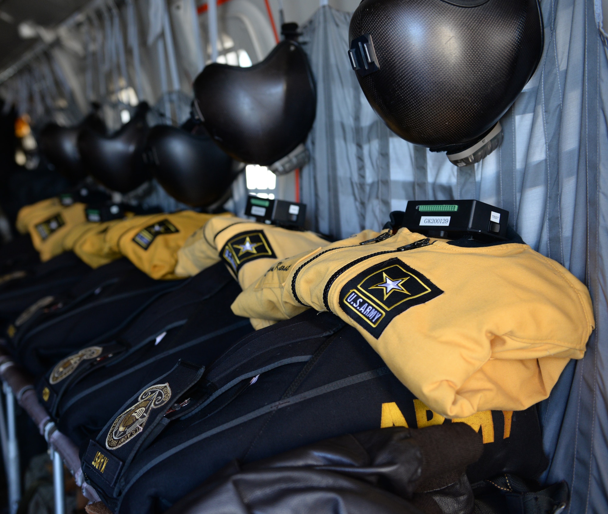 U.S. Army Parachute Team "Golden Knights" gear is prepared for flight aboard a C-31A Troopship on Barksdale Air Force Base, Louisiana, May 1, 2015. The Golden Knights, stationed at Fort Bragg, North Carolina, flew to Barksdale to take part in the Defenders of Liberty Airshow. The team travels the globe connecting the public with the finest Soldiers and Official Ambassadors the Army has to offer. The Golden Knights have performed more than 15,000 shows in 49 countries, reaching more than 200,000 people per show. (U.S. Air Force photo/Airman 1st Class Curt Beach)