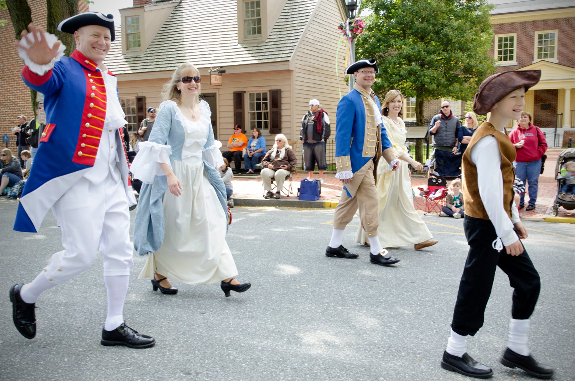 Col. Raymond A. Kozak, 512th Airlift Wing commander, and his wife Maureen, marches with Col. Michael W. Grismer, 436th Airlift Wing commander, and his family, in the Old Dover Days parade and festival at Dover, Del., May 2, 2015. Old Dover Days offers a glimpse of the state capital and features a parade, maypole dancing, walking tours, entertainment, art, crafts and food. More than 1,800 reservists serve in the 512th AW, which flies the C-17 Globemaster III and C-5 Galaxy. The wing is the only Air Force Reserve unit in Delaware .(U.S. Air Force photo/2nd Lt. Steve Lewis)

