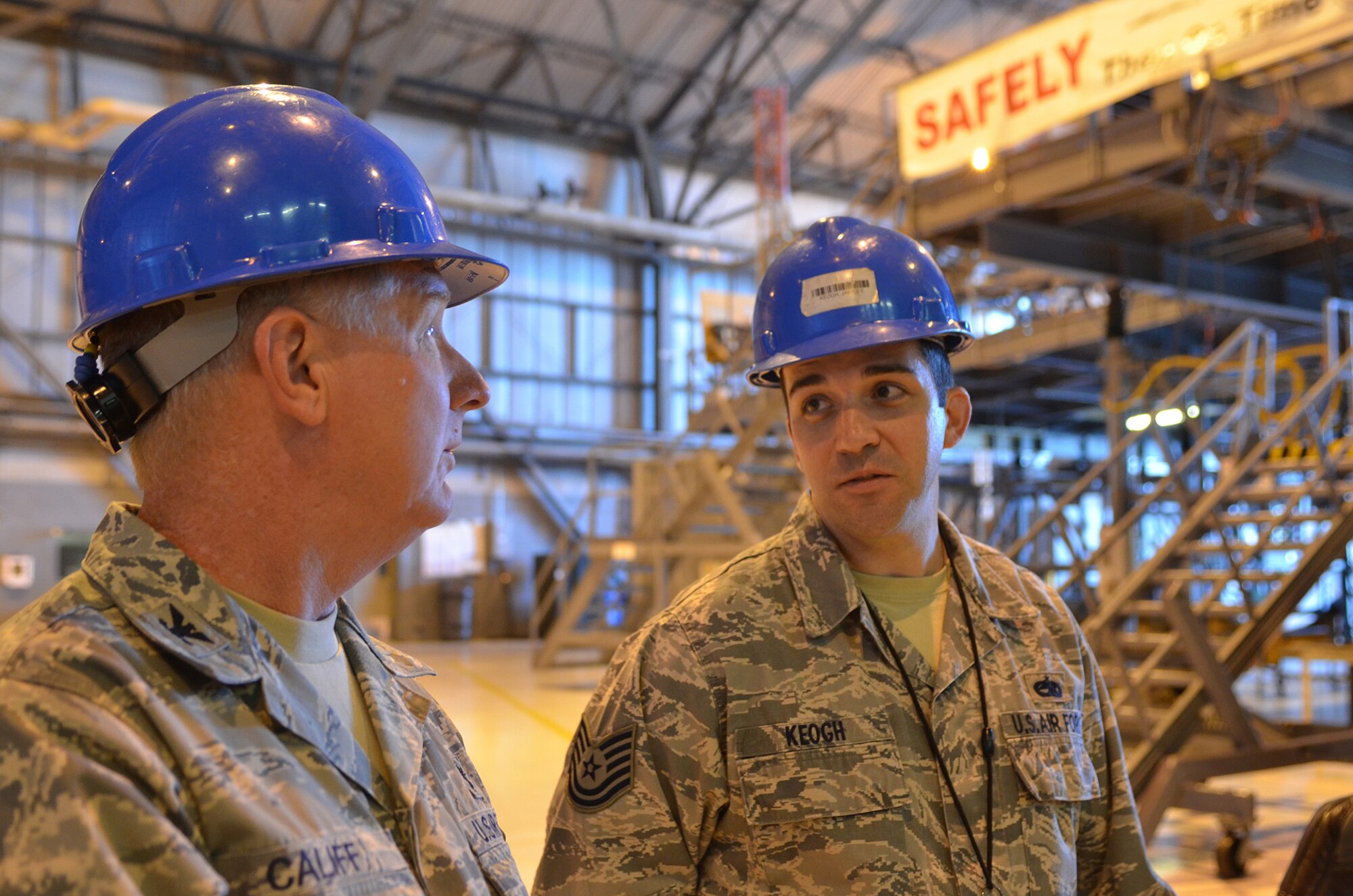U.S. Air Force Reserve Command Chaplain (Col.) Gary R. Califf learns more about the 512th Maintenance Squadron from Tech. Sgt. James Keogh, 512 MXS, at Dover Air Force Base, Del., May 3, 2015. Chaplain Califf visited the 512th Airlift Wing during the May Unit Training Assembly and met with Reserve Airmen throughout the weekend. (U.S. Air Force photo/2nd Lt. Steve Lewis)
