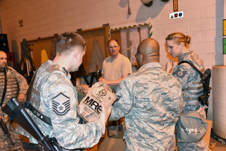 Meals ready to eat. (MRE) are handed out by our services section during an activation of the Maryland Air National Guard for Operation Baltimore Rally in Baltimore, May 2, 2015 