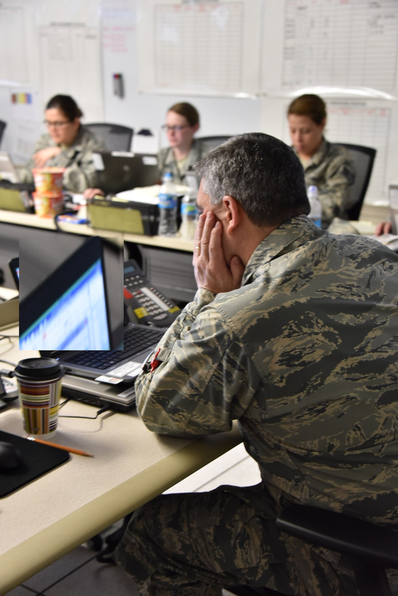 Maryland Air National Guardsmen work in the Emergency Operations Center at Warfield Air National Guard Base in Baltimore May 1. The Airmen are supporting Operation Baltimore Rally during the state of emergency in Baltimore. (U.S. Air National Guard photo by Senior Master Sgt. Ed Bard/RELEASED)