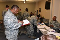 Maryland Air National Guardsmen in process at Warfield Air National Guard Base in Baltimore May 1. The Airmen are supporting Operation Baltimore Rally during the state of emergency in Baltimore. (U.S. Air National Guard photo by Senior Master Sgt. Ed Bard/RELEASED)