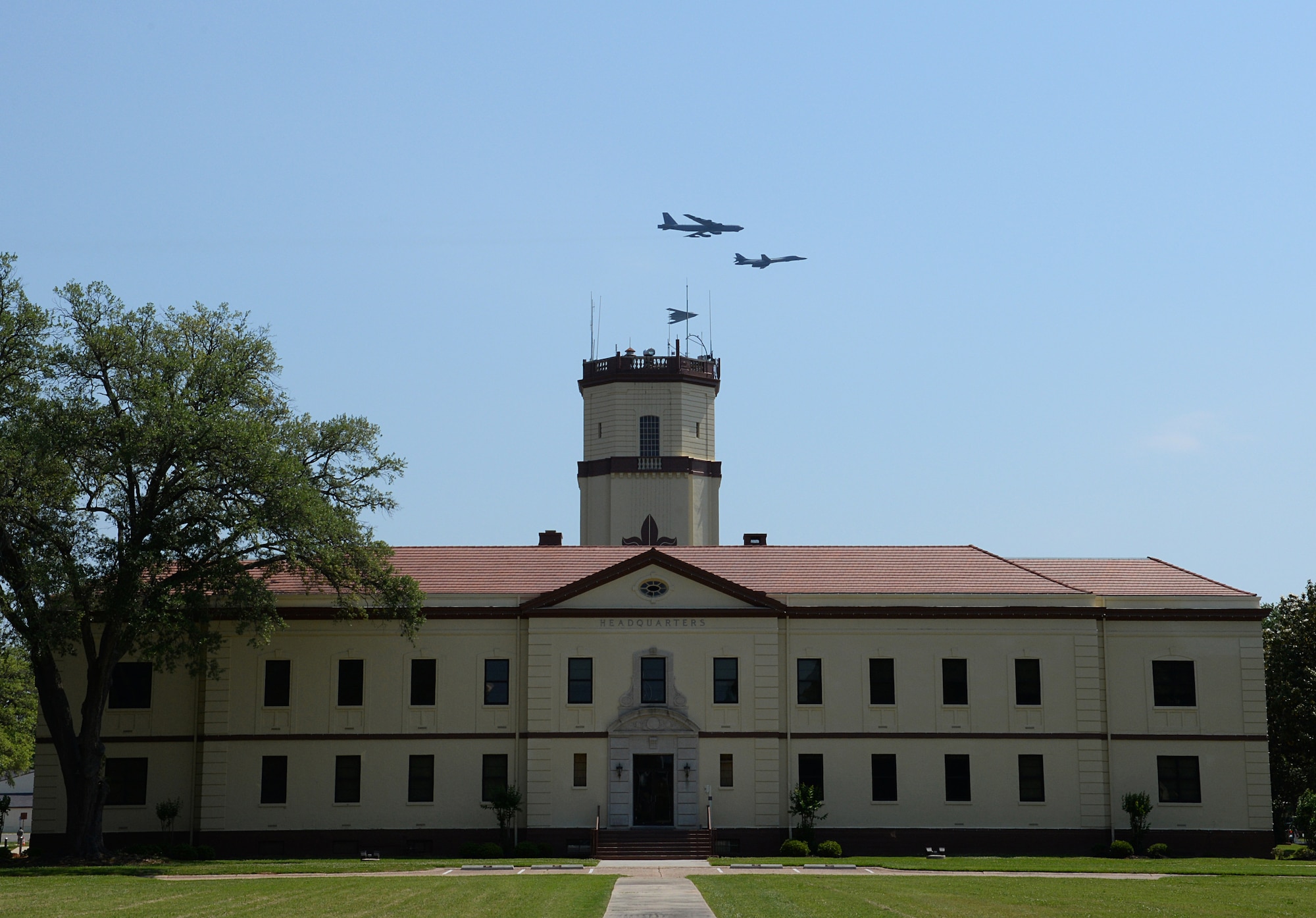 A B-52H Stratofortress, B-1B Lancer and B-2 Spirit soar over the 2nd Bomb Wing Headquarters during the 2015 Defenders of Liberty Air Show at Barksdale Air Force Base, Louisiana, May 3. Effective Oct. 1, the B-1 bomber fleet will realign from Air Combat Command to Air Force Global Strike Command. Under the realignment, 63 aircraft and more than 7,000 personnel will join AFGSC. (U.S. Air Force photo/Airman 1st Class Curt Beach) 