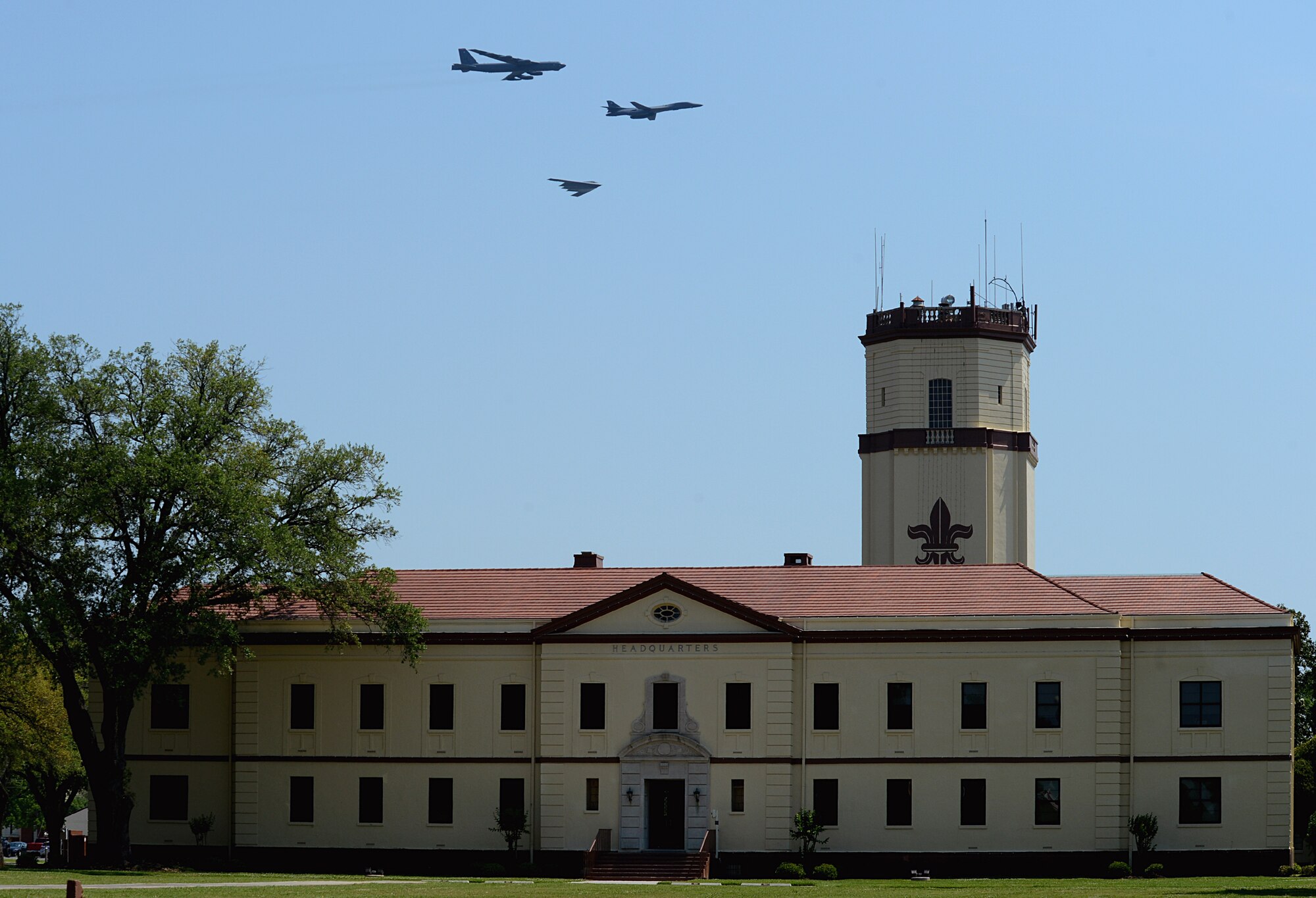 A B-52H Stratofortress, B-1B Lancer and B-2 Spirit soar over the 2nd Bomb Wing Headquarters during the 2015 Defenders of Liberty Air Show at Barksdale Air Force Base, La., May 3. Starting Oct. 1, the B-1 bomber fleet will realign from Air Combat Command to Air Force Global Strike Command. Under the realignment, 63 aircraft and more than 7,000 personnel will join AFGSC. (U.S. Air Force photo/Senior Airman Benjamin Gonsier)