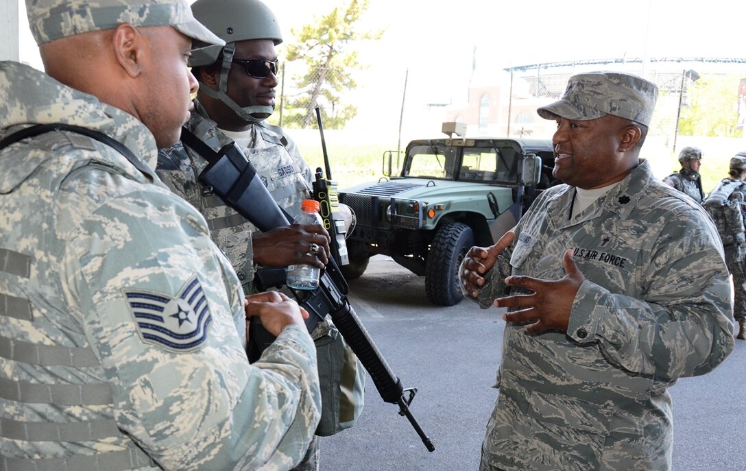 Lt. Col. Ivan Williams, right, 175th Wing chaplain, talks to members of the Maryland Air National Guard in Baltimore May 2. The Airmen are part of Operation Baltimore Rally during the state of emergency in Baltimore.(U.S. Air National Guard photo by Tech. Sgt. David Speicher/RELEASED) 